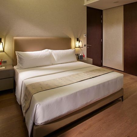 I'M Hotel Makati City Exterior foto A bedroom at the hotel